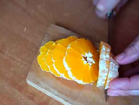 Режем апельсин кольцами